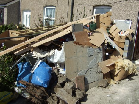 Team performing garden clearance in Sudbury
